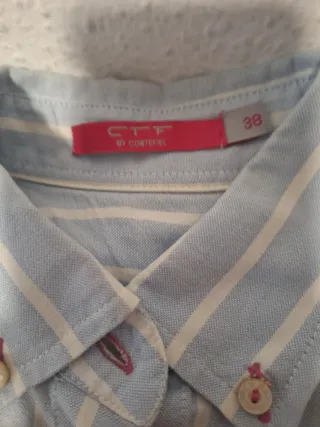 Blusa de rayas azul y blanco