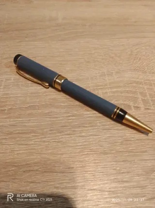 Elegante bolígrafo azul y dorado(acepto ofertas)