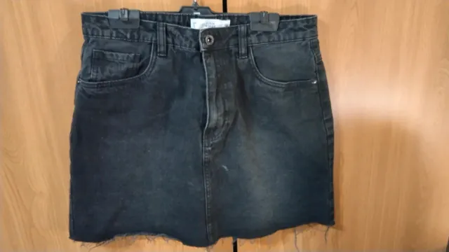 Minifalda vaquera negra tiro alto