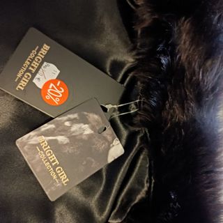 Abrigo de piel negro cobrizo