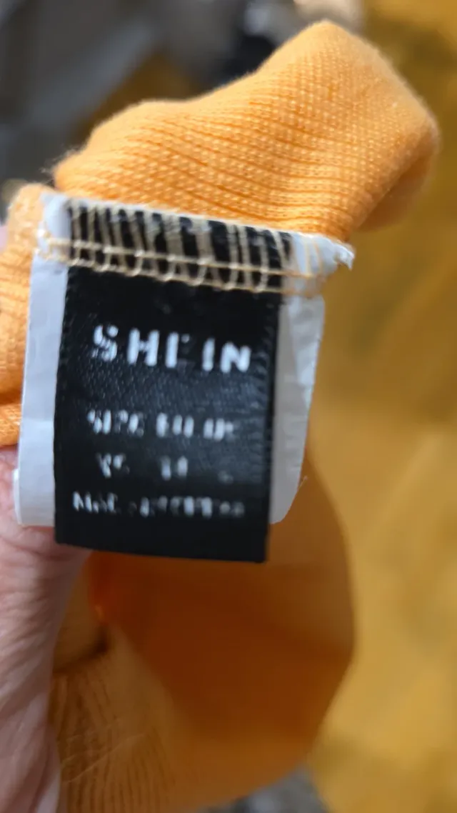 Top naranja cruzado canalé