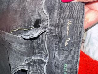 Vaqueros grises con pedrería en tobillo