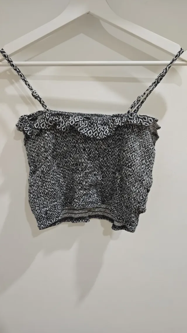 Top estampado con volantes