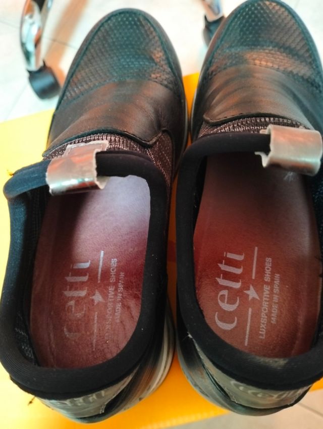 Botas de plataforma de piel negras y plateadas