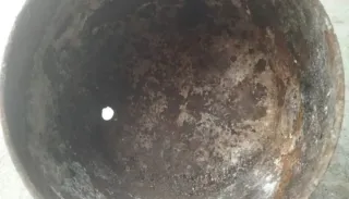 Antigua pota o pote de hierro fundido