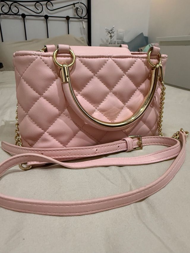 Bolso de mano rosa acolchado dorado
