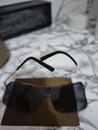 Occhiali da sole Gucci a mascherina