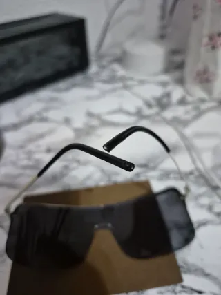 Occhiali da sole Gucci a mascherina