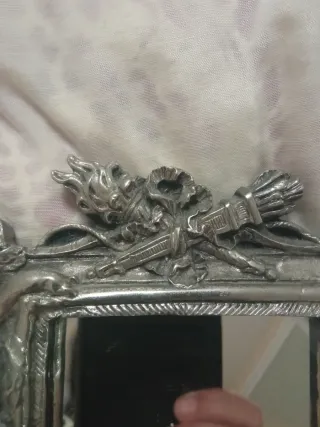 Espejo de plata antiguo con querubines