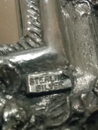 Espejo de plata antiguo con querubines