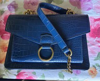 Borsa Zuiki blu con dettagli oro