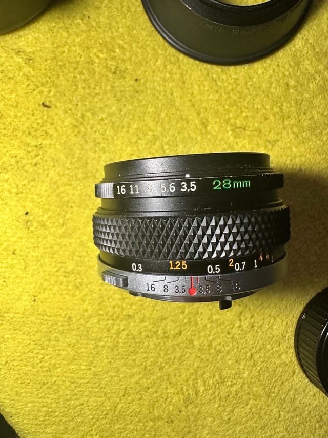 Olympus Zuiko 28mm f/3.5 + Custodia