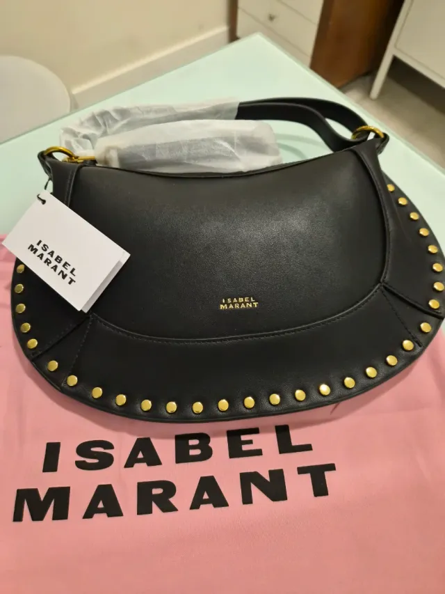 Bolso Isabel Marant Oskan Moon Negro Dorado.