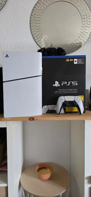 PS5 Digital Edition casi nueva + mando