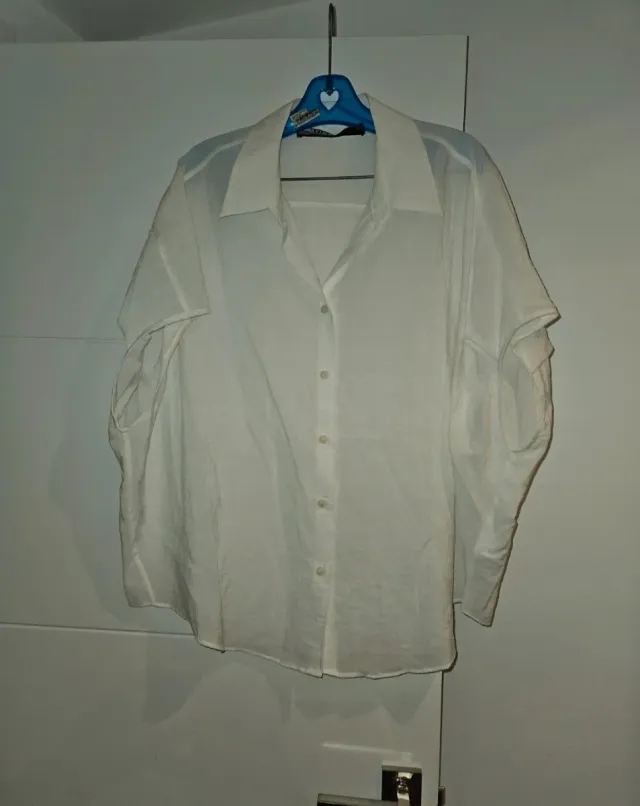 Camisa blanca sin mangas