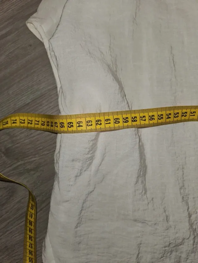 Camisa blanca sin mangas