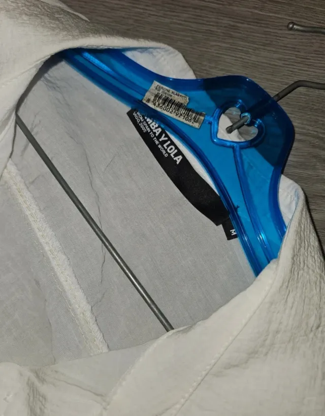 Camisa blanca sin mangas