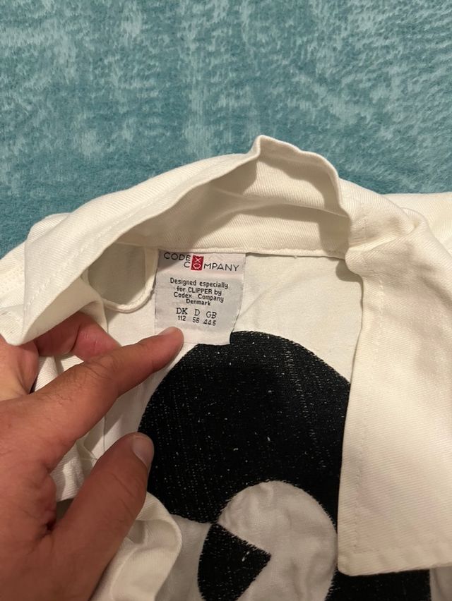 Buzo de trabajo blanco con bolsillos