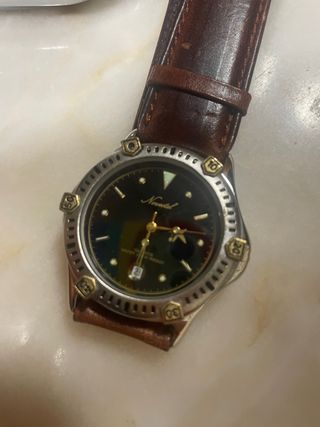 Reloj Novotel Hombre Negro y Dorado