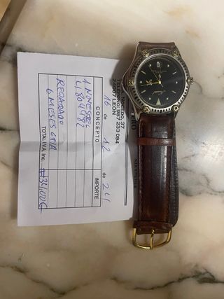 Reloj Novotel Hombre Negro y Dorado