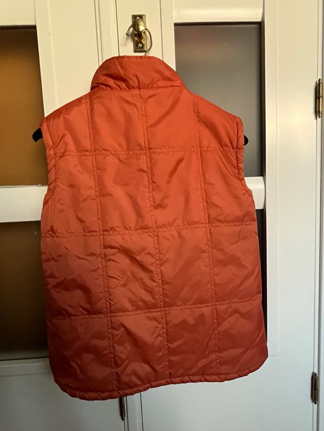 Colete reversível infantil laranja/marrom