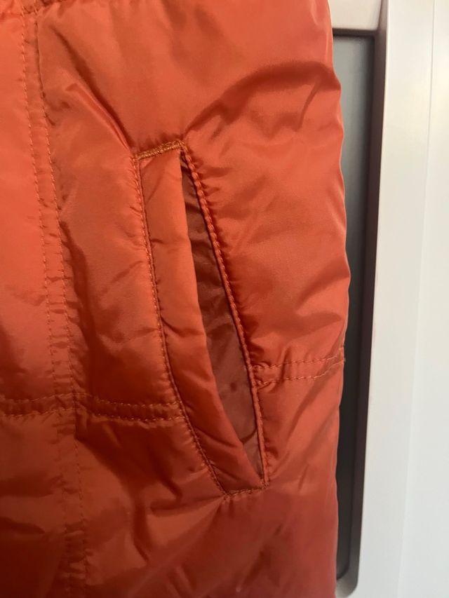 Colete reversível infantil laranja/marrom