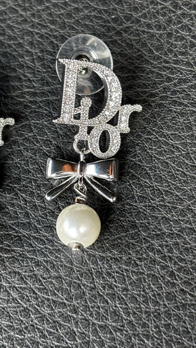 Dior pendientes silver-tone con perla y lazo