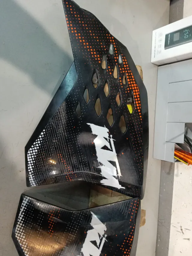 Tapas laterales KTM 2008-2011