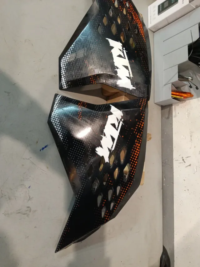 Tapas laterales KTM 2008-2011