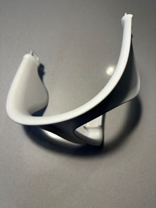 Protector de trona Nomi para bebé blanco