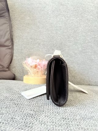 Borsa Guess nera con logo G strass