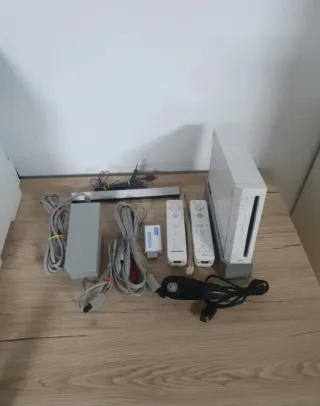 Nintendo Wii Blanca con 2 mandos y más de 50 juego