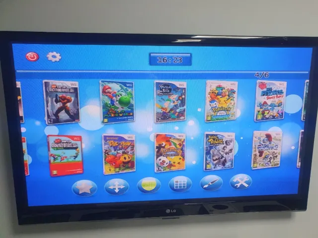 Nintendo Wii Blanca con 2 mandos y más de 50 juego