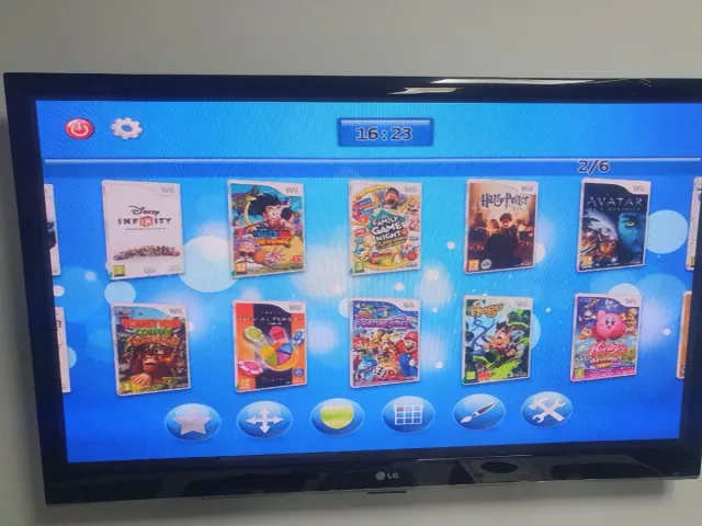 Nintendo Wii Blanca con 2 mandos y más de 50 juego