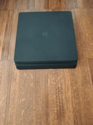 PS4 Slim 500 GB Negra con dos mandos y juegos