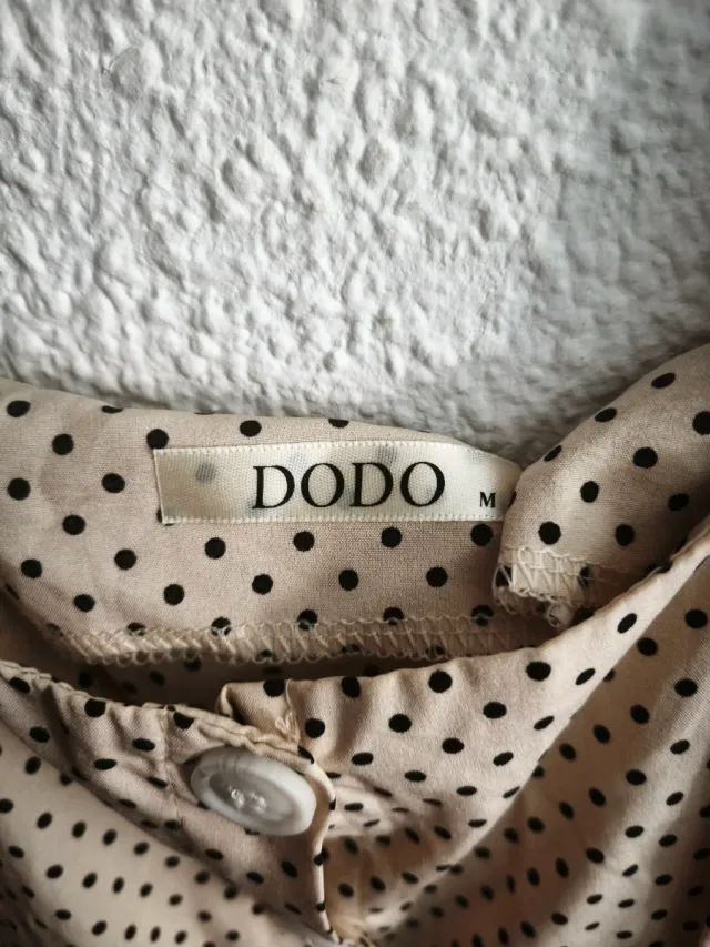 Vestido de lunares beige y negro