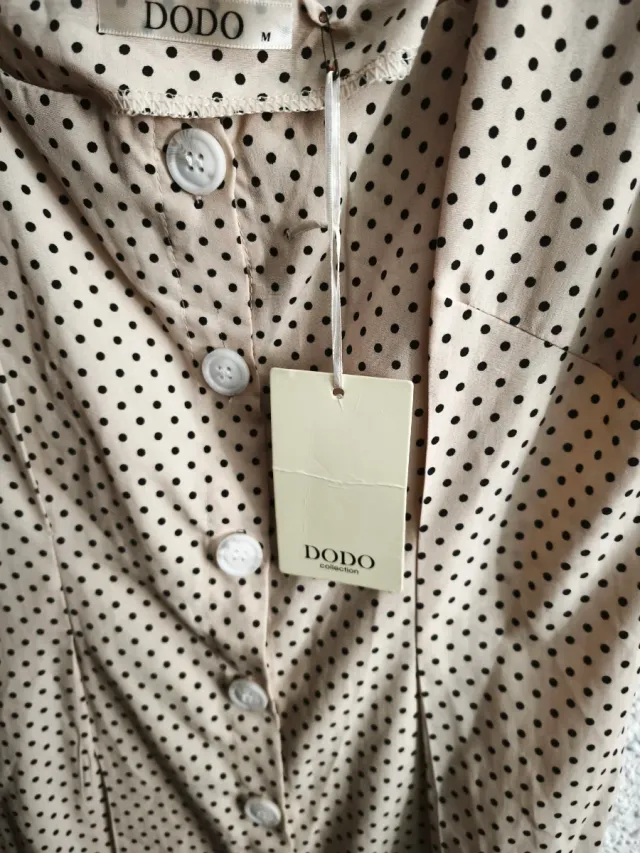 Vestido de lunares beige y negro