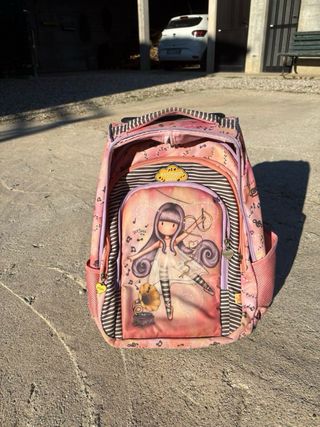 Cartella con carrello e disegno bambina