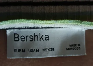 Top de rayas verde y negro