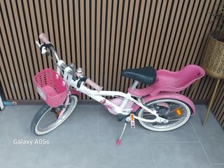 Bicicleta infantil rosa y blanca