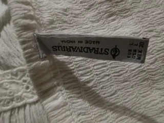 Top blanco con tirantes y volantes