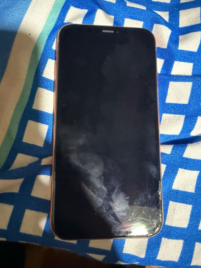 iPhone XR Coral Bloccato per pezzi