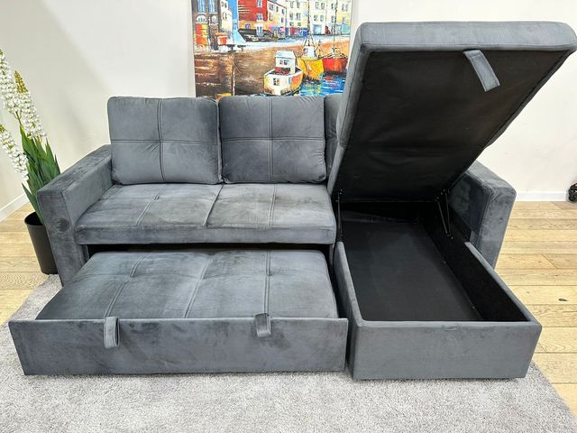 Sofá cama gris de tela