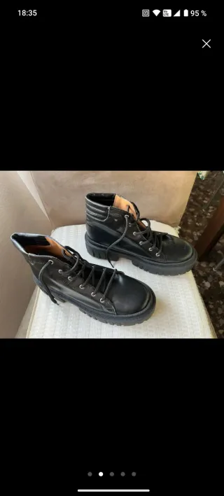 Botas de piel negras nuevas