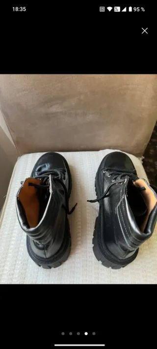 Botas de piel negras nuevas