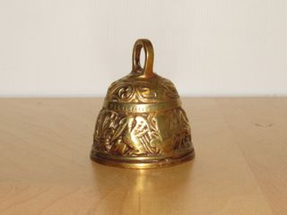 Antigua campana evangelistas animales león ave