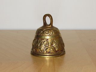 Antigua campana evangelistas animales león ave