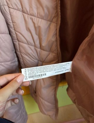 Piumino rosa con cappuccio