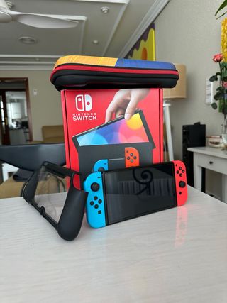 Nintendo Switch OLED Roja y Azul + Complementos