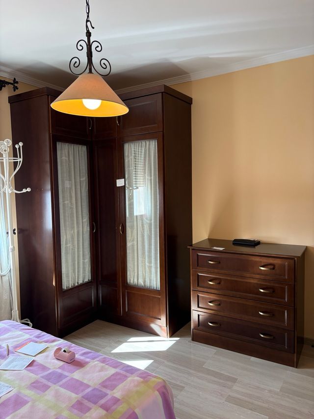 Dormitorio completo madera y forja